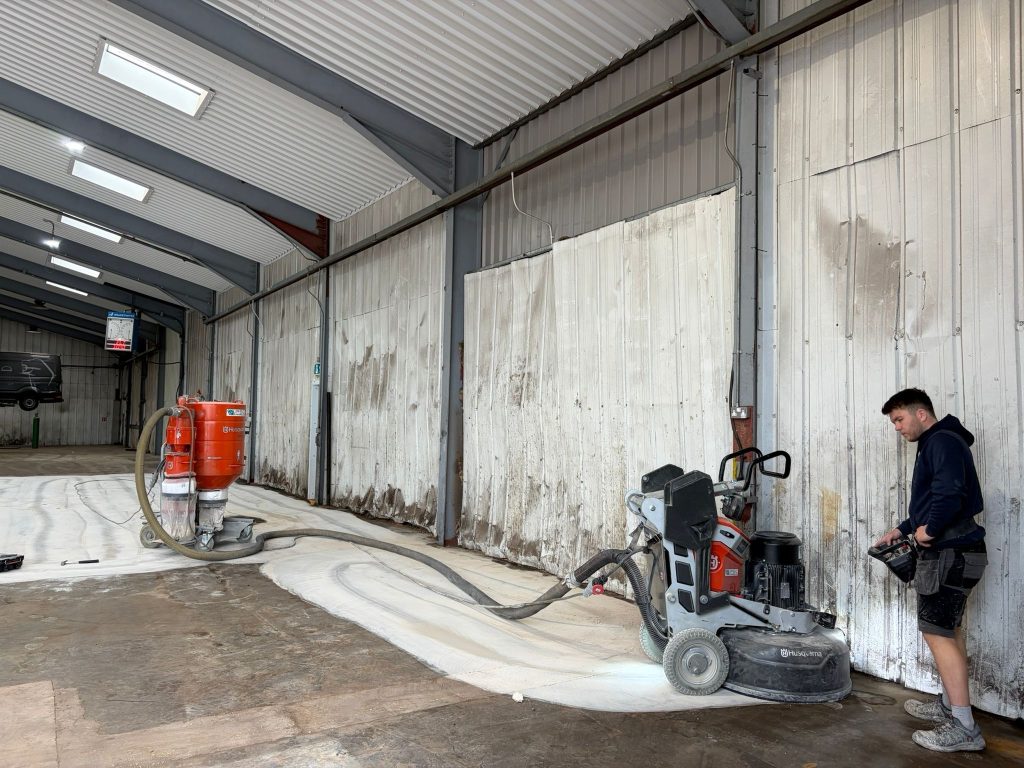 Diamond grinding the floor edges in the HGV workshop