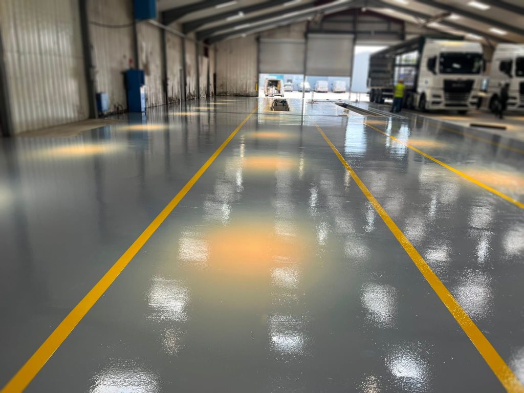 Safety Yellow reversing lines on the Pumatect workshop floor