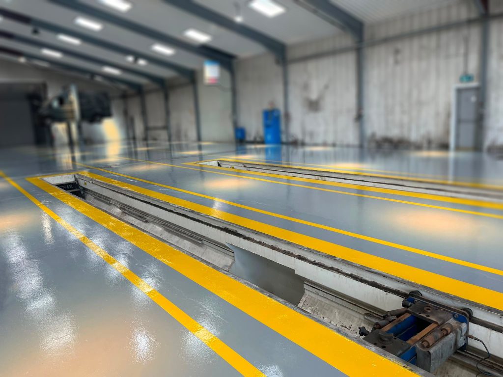 Safety Yellow demarcation around an HGV pit