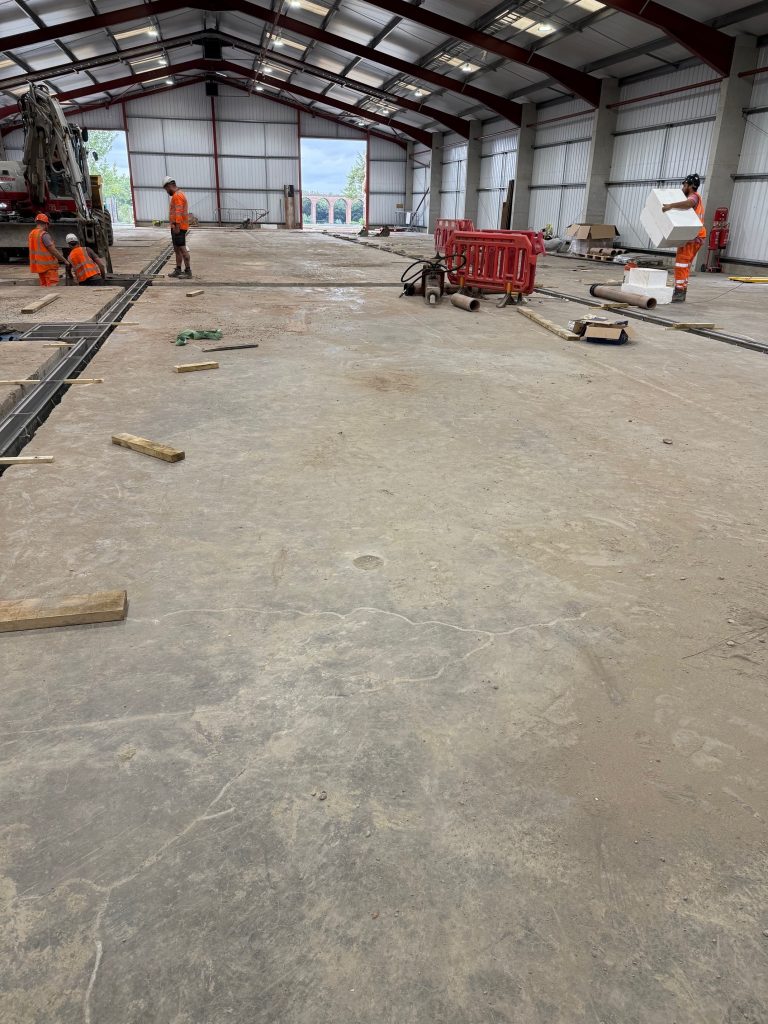 Production hall groundworks before the resin flooring