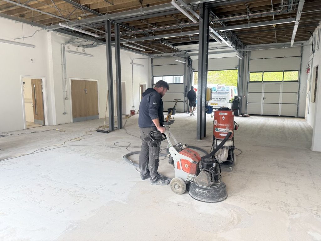 Diamond grinding the concrete floor at Monmouth Ambulance Station