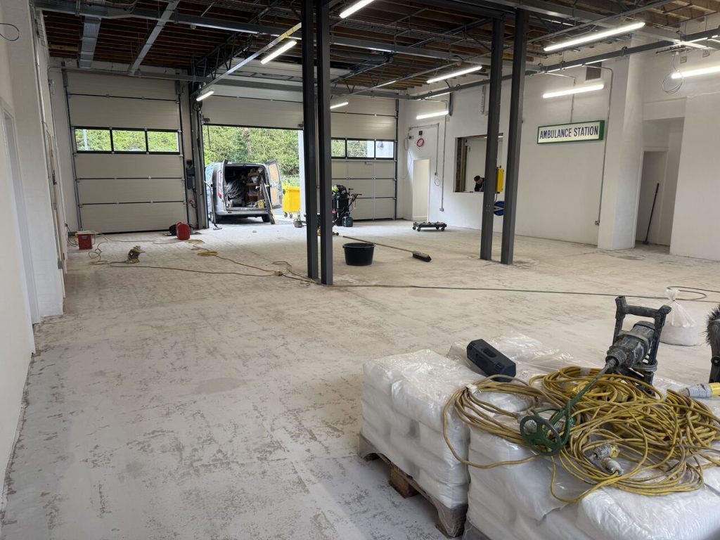 Concrete substrate prepared for resin flooring at Monmouth Ambulance Station