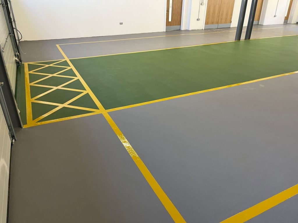 Pumadur RT floor in Mid Grey and Green with Safety Yellow hatching