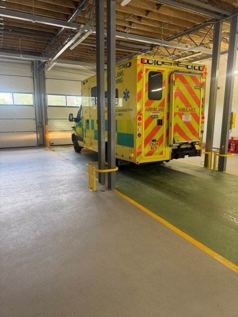 Ambulance bay with Safety Yellow column guards and walkways