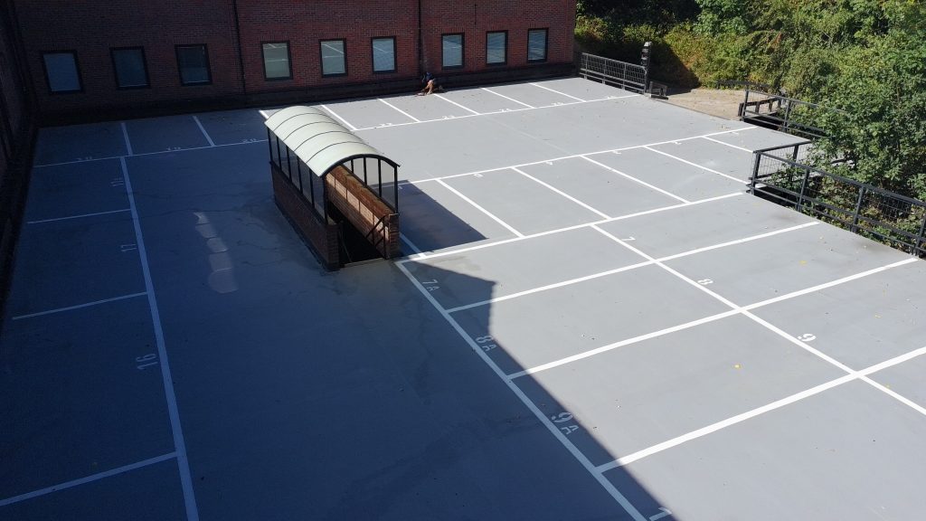 Aerial view of the finished Deckmaster System R top deck at an office block car park