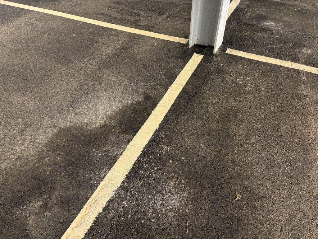 Cracking across the original car park deck