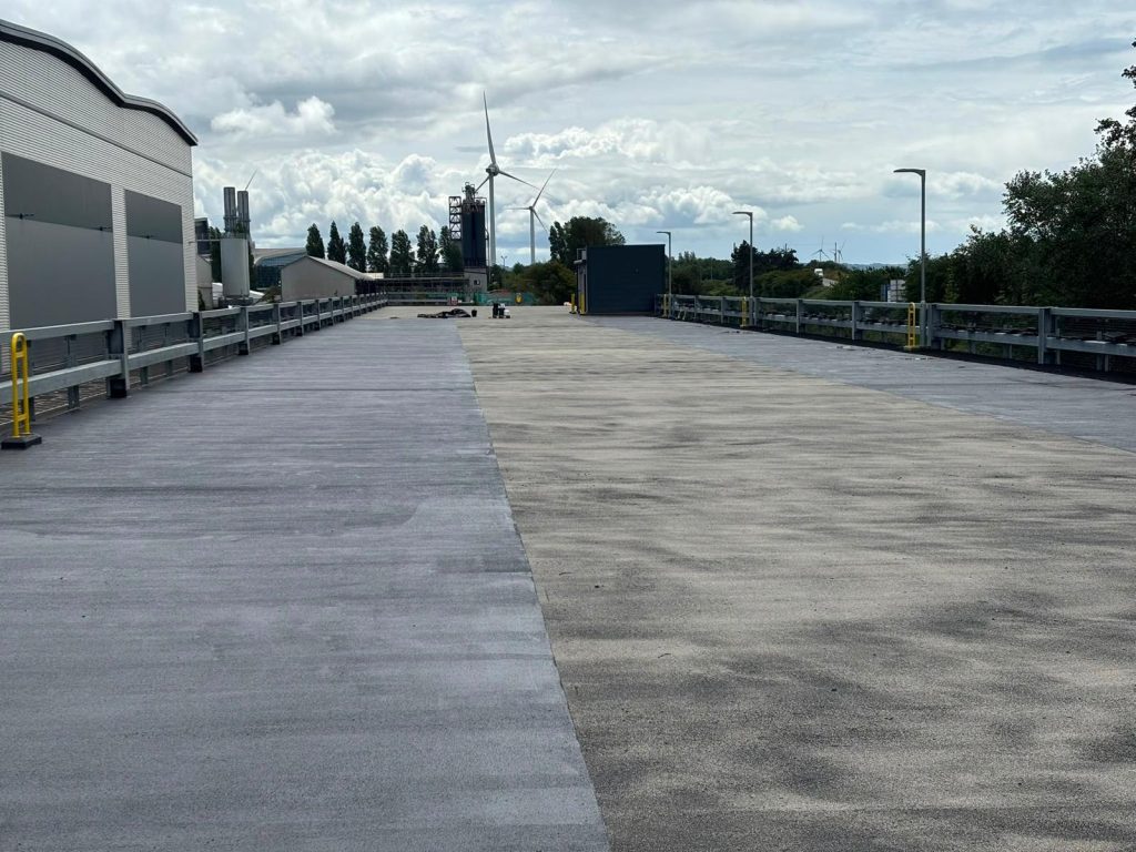 New Deckmaster System R coating alongside the original deck